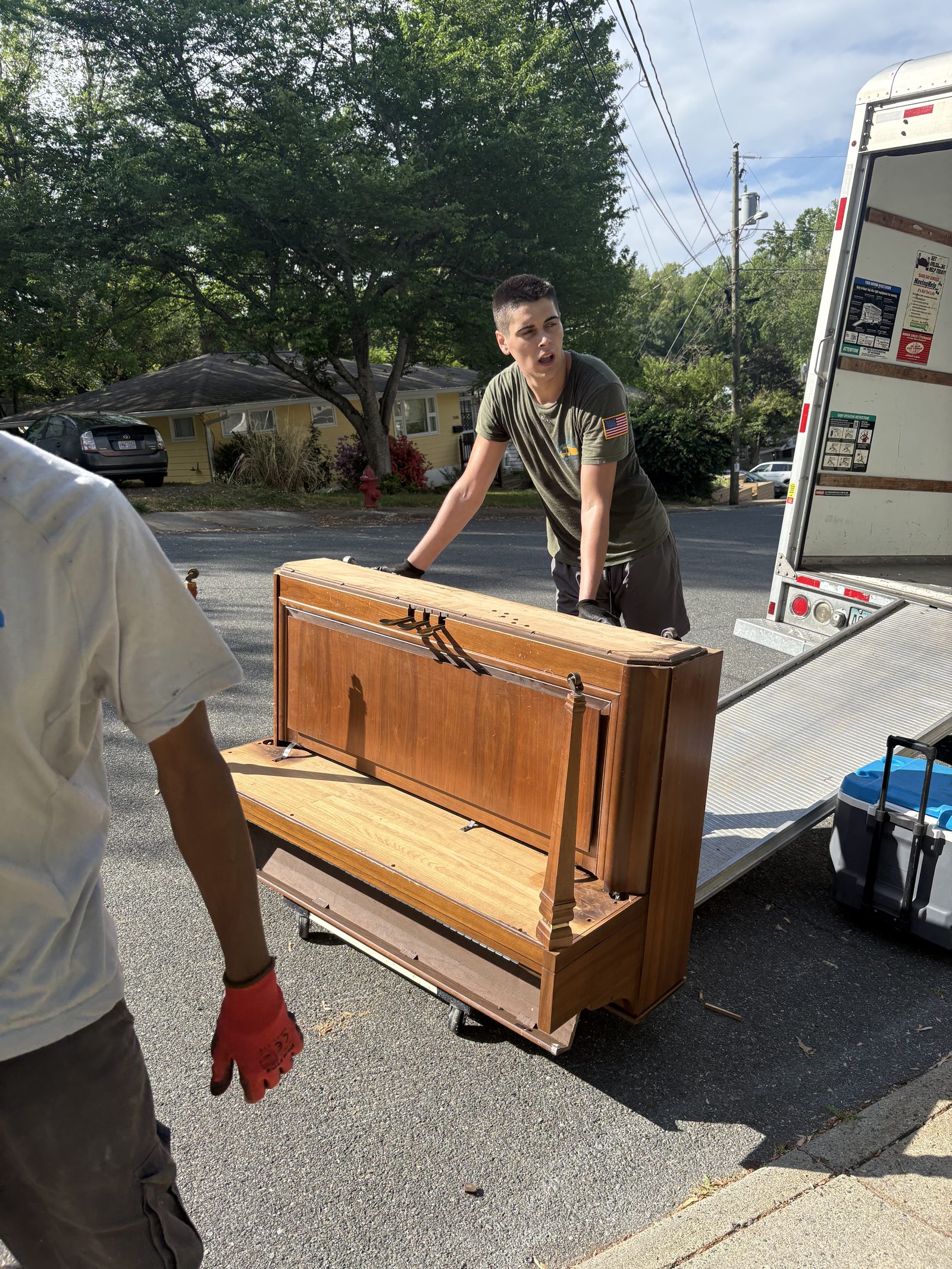 Piano being loaded for removal Charlottesville VA