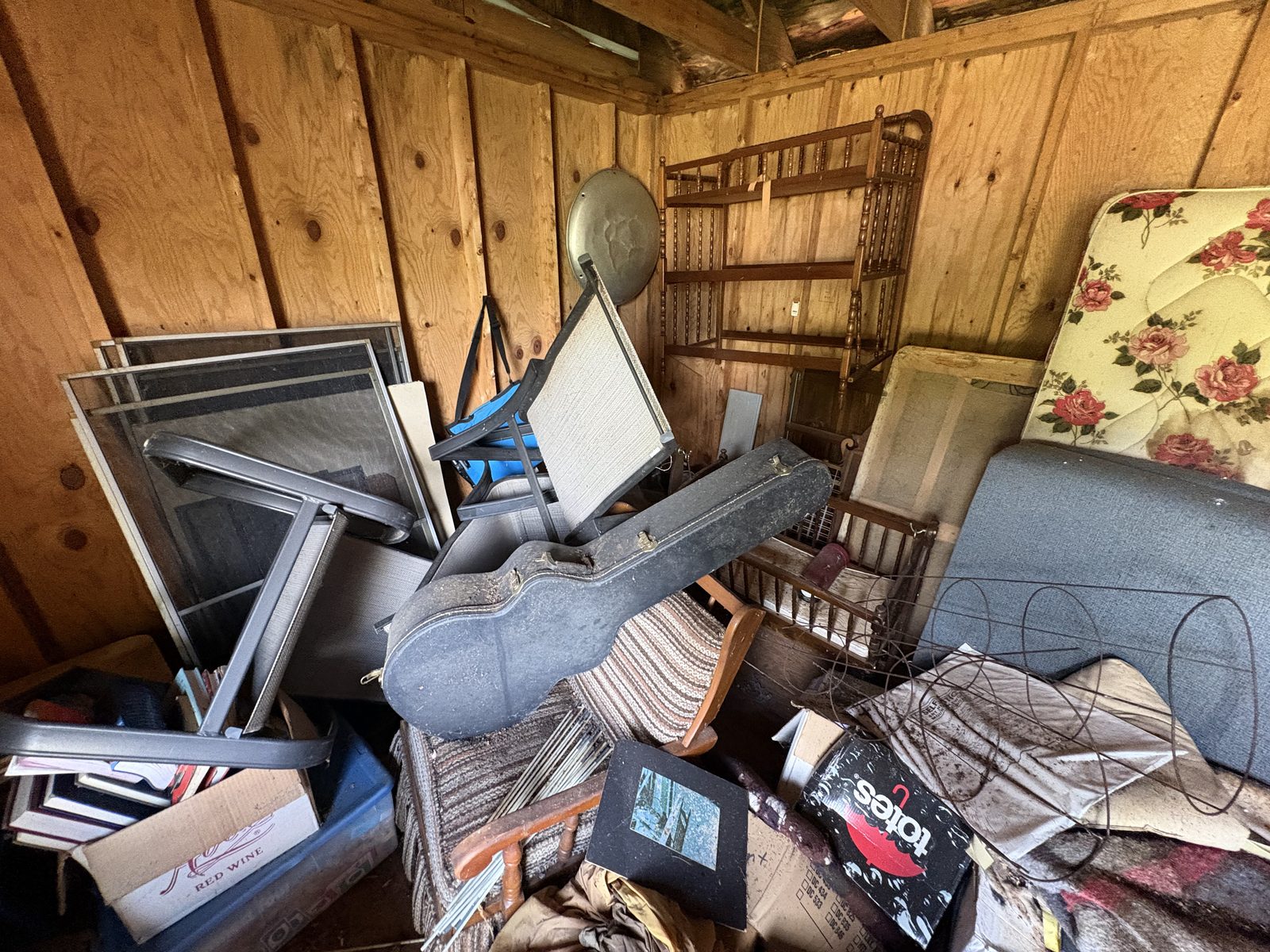 Shed interior packed with items before demolition — Charlottesville VA